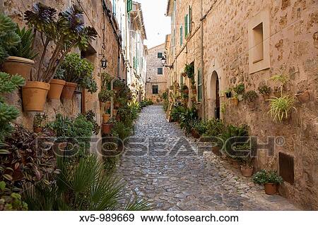Street in Valldemosa, in Serra de Tramuntana. Mallorca. Balearic Island. Spain View Large Photo Image Stock Photo - Street in Valldemosa, in Serra de Tramuntana. Mallorca. Balearic Island. Spain. Fotosearch