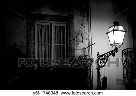 Stock Photo - Street lamp in a street of Lisbon. Fotosearch