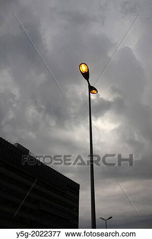 street lamps and dark rain clouds in rome italy. View Large Photo Image Stock Photo - street lamps and dark rain clouds in rome italy.. Fotosearch