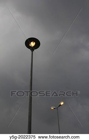 street lamps and dark rain clouds in rome italy. View Large Photo Image Stock Photography - street lamps and dark rain clouds in rome italy.. Fotosearch