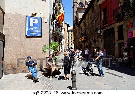 Stock Photograph - Street Life in the old Town of Barcelona, Spain.. Fotosearch