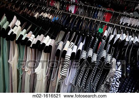 street market in modern clothing in a street in a French village View Large Photo Image Stock Image - street market in modern clothing in a street in a French village. Fotosearch
