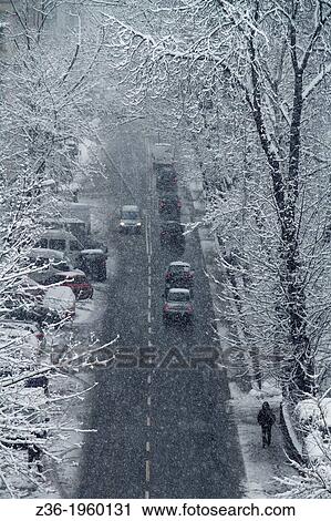 Stock Image - Street of Krakow at snowy day, Poland.. Fotosearch