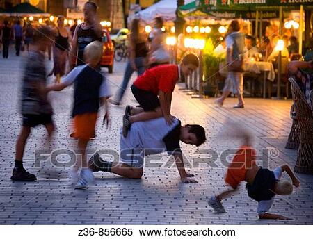 Street performance at Mian Market Square, Krakow, Poland View Large Photo Image Stock Photography - Street performance at Mian Market Square, Krakow, Poland. Fotosearch