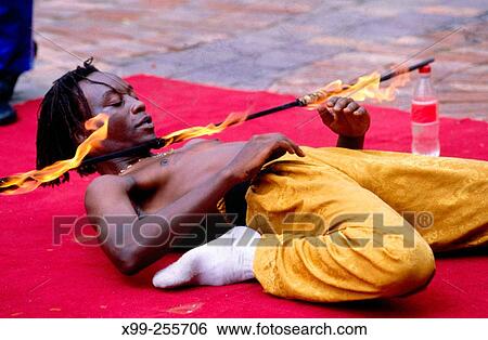 Street performer entertainment at Gold Reef City Theme Park. Johannesburg. South Africa View Large Photo Image Stock Photograph - Street performer entertainment at Gold Reef City Theme Park. Johannesburg. South Africa. Fotosearch