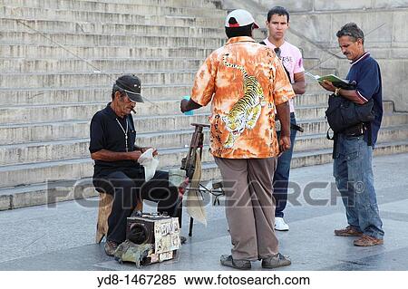 Street photographer with a box camera in Old Havana, Cuba View Large Photo Image Stock Photography - Street photographer with a box camera in Old Havana, Cuba. Fotosearch