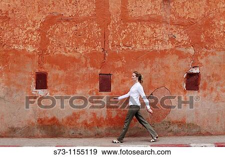 Street scene, young woman walking, Marrakesh, Morocco, Africa View Large Photo Image Stock Photo - Street scene, young woman walking, Marrakesh, Morocco, Africa. Fotosearch