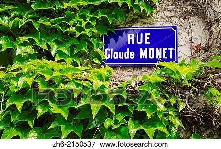 Street sign and ivy covered wall, Giverny, Normandy, France. View Large Photo Image Stock Photo - Street sign and ivy covered wall, Giverny, Normandy, France.. Fotosearch
