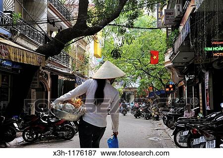 street vendor in the Old Quarter of Hanoi, Northern Vietnam, southeast asia View Large Photo Image Stock Photo - street vendor in the Old Quarter of Hanoi, Northern Vietnam, southeast asia. Fotosearch