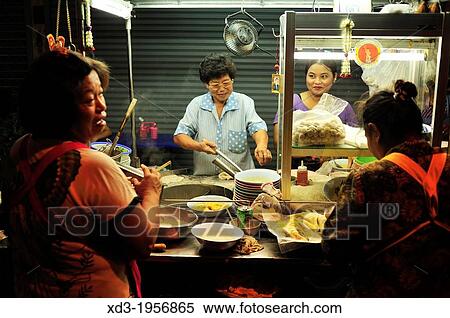 street vendors cooking in Thonburi district of Bangkok, Thailand. View Large Photo Image Stock Photography - street vendors cooking in Thonburi district of Bangkok, Thailand.. Fotosearch