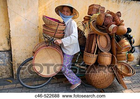 Street vendors. Ho Chi Min City (Saigon). Vietnam. View Large Photo Image Stock Photo - Street vendors. Ho Chi Min City (Saigon). Vietnam.. Fotosearch