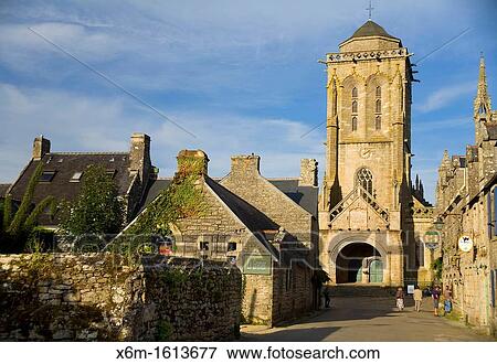 Street view and St Ronan church Locronan Lokorn in Breton Finist? re department in Bretagne in northwestern France View Large Photo Image Stock Photo - Street view and St Ronan church Locronan Lokorn in Breton Finist? re department in Bretagne in northwestern France. Fotosearch