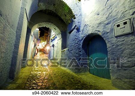 Street with arches in the medina of Chefchaouen, Morocco. View Large Photo Image Stock Image - Street with arches in the medina of Chefchaouen, Morocco.. Fotosearch