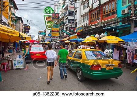Street with backpackers and young travelers Khao San Road Bangkok Thailand Southeast Asia Asia. View Large Photo Image Stock Photo - Street with backpackers and young travelers Khao San Road Bangkok Thailand Southeast Asia Asia.. Fotosearch