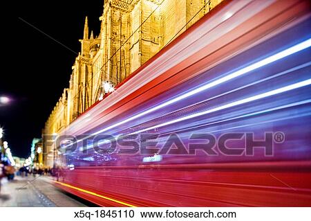 Streetcar passing by in front of Seville's Cathedral, Spain View Large Photo Image Stock Image - Streetcar passing by in front of Seville's Cathedral, Spain. Fotosearch