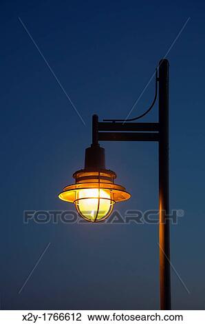 Streetlamp at night View Large Photo Image Stock Image - Streetlamp at night. Fotosearch