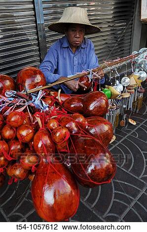 Streetseller in Bangkok View Large Photo Image Stock Image - Streetseller in Bangkok. Fotosearch