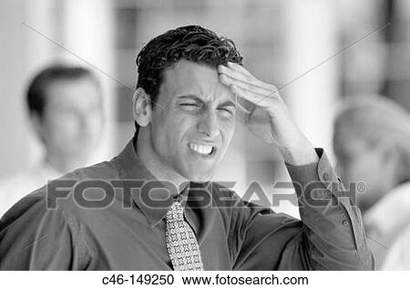 Stock Image - Stressed executive. Fotosearch