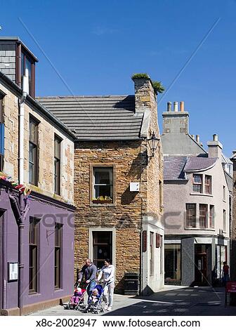 Stromness, the second largest town on the Orkney Islands. europe, central europe, northern europe, united kingdom, great britain, scotland, northern isles, orkney islands, June. View Large Photo Image Stock Photo - Stromness, the second largest town on the Orkney Islands. europe, central europe, northern europe, united kingdom, great britain, scotland, northern isles, orkney islands, June.. Fotosearch