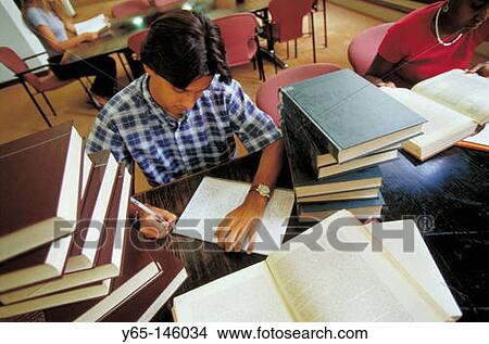 Student in library View Large Photo Image Picture - Student in library. Fotosearch