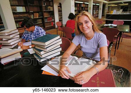 Student in library View Large Photo Image Stock Image - Student in library. Fotosearch