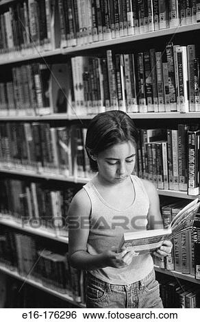 Student in library View Large Photo Image Stock Photograph - Student in library. Fotosearch