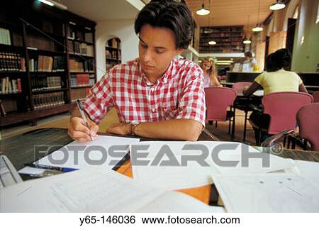 Student in library View Large Photo Image Stock Photograph - Student in library. Fotosearch