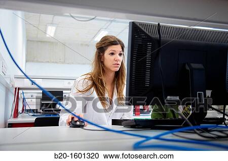 Stock Image - Student in the Biomedical Instrumentation Laboratory, Biomedical Engineering, CEIT (Center of Studies and Technical Research), University of Navarra, Donostia, Gipuzkoa, Basque Country, Spain. Fotosearch