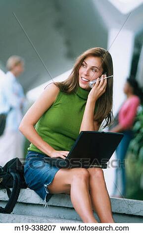 student on campus with cellular View Large Photo Image Stock Photo - student on campus with cellular. Fotosearch