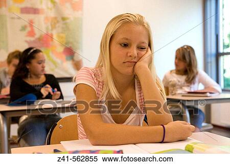 Stock Photography - Student sitting in the classroom. Fotosearch
