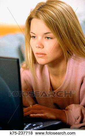 Student using laptop View Large Photo Image Stock Photo - Student using laptop. Fotosearch