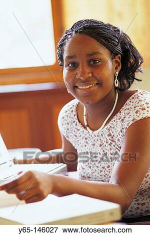 Student with laptop computer View Large Photo Image Stock Photo - Student with laptop computer. Fotosearch