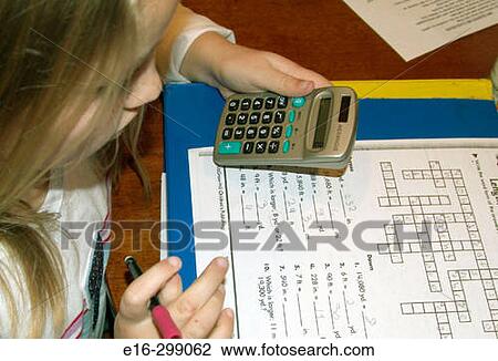 Stock Image - student working with calculator. Fotosearch