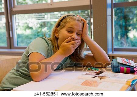 Student yawning in the classroom View Large Photo Image Stock Image - Student yawning in the classroom. Fotosearch