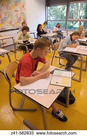 Stock Image - Students in a classroom.. Fotosearch