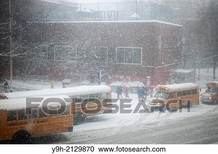 Students pass snow covered school buses as they enter Public School 33 in the Chelsea neighborhood of New York. View Large Photo Image Stock Image - Students pass snow covered school buses as they enter Public School 33 in the Chelsea neighborhood of New York.. Fotosearch