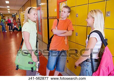 Students talking in the hallway. View Large Photo Image Stock Photo - Students talking in the hallway.. Fotosearch