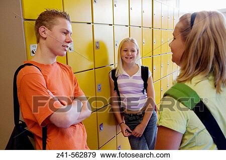 Students talking in the hallway. View Large Photo Image Stock Photo - Students talking in the hallway.. Fotosearch