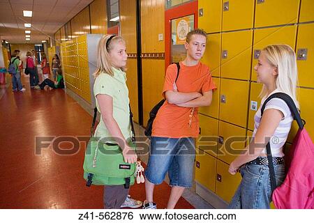 Stock Photograph - Students talking in the hallway.. Fotosearch