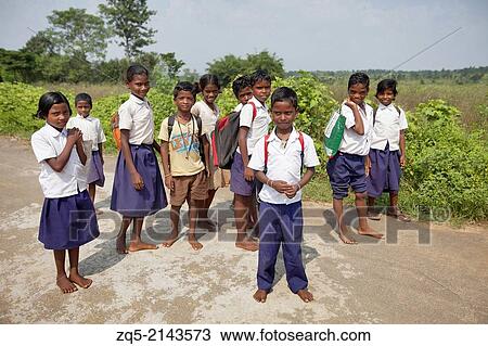 Students walking to school bare footed on road. Santhal tribe. Jarkatand village, Bokaro district, Jharkhand. View Large Photo Image Stock Image - Students walking to school bare footed on road. Santhal tribe. Jarkatand village, Bokaro district, Jharkhand.. Fotosearch