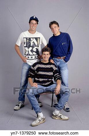 studio portrait full length of three happy teenage boys View Large Photo Image Stock Image - studio portrait full length of three happy teenage boys. Fotosearch