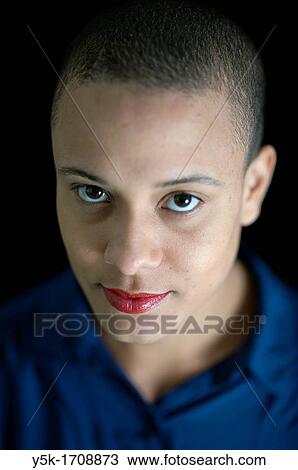 Studio-portrait of a young, African woman. View Large Photo Image Stock Image - Studio-portrait of a young, African woman.. Fotosearch