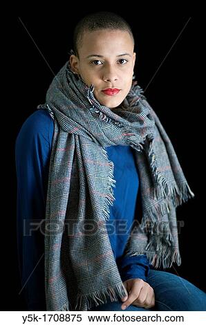 Studio-portrait of a young, African woman. View Large Photo Image Stock Photography - Studio-portrait of a young, African woman.. Fotosearch