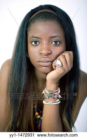 Studio portrait of a young negress teenager with bracelets. View Large Photo Image Stock Image - Studio portrait of a young negress teenager with bracelets.. Fotosearch