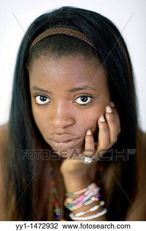 Studio portrait of a young negress teenager with bracelets. View Large Photo Image Stock Image - Studio portrait of a young negress teenager with bracelets.. Fotosearch