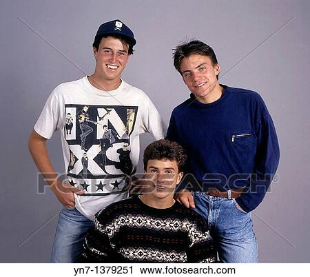 studio portrait of three happy teenage boys in medium close-up View Large Photo Image Stock Image - studio portrait of three happy teenage boys in medium close-up. Fotosearch