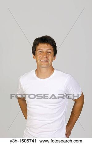 Stock Image - Studio shot of Argentinian man, looking at camera. Fotosearch