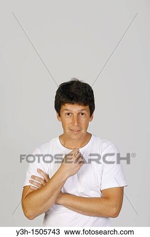 Studio shot of Argentinian man, looking at camera View Large Photo Image Stock Image - Studio shot of Argentinian man, looking at camera. Fotosearch