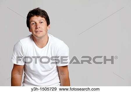 Studio shot of Argentinian man, looking at camera View Large Photo Image Stock Photo - Studio shot of Argentinian man, looking at camera. Fotosearch