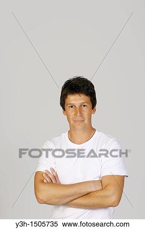 Studio shot of Argentinian man, looking at camera View Large Photo Image Stock Photography - Studio shot of Argentinian man, looking at camera. Fotosearch